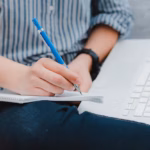 student-studying-home-working-with-her-laptop-doing-homework-close-up_73683-2107